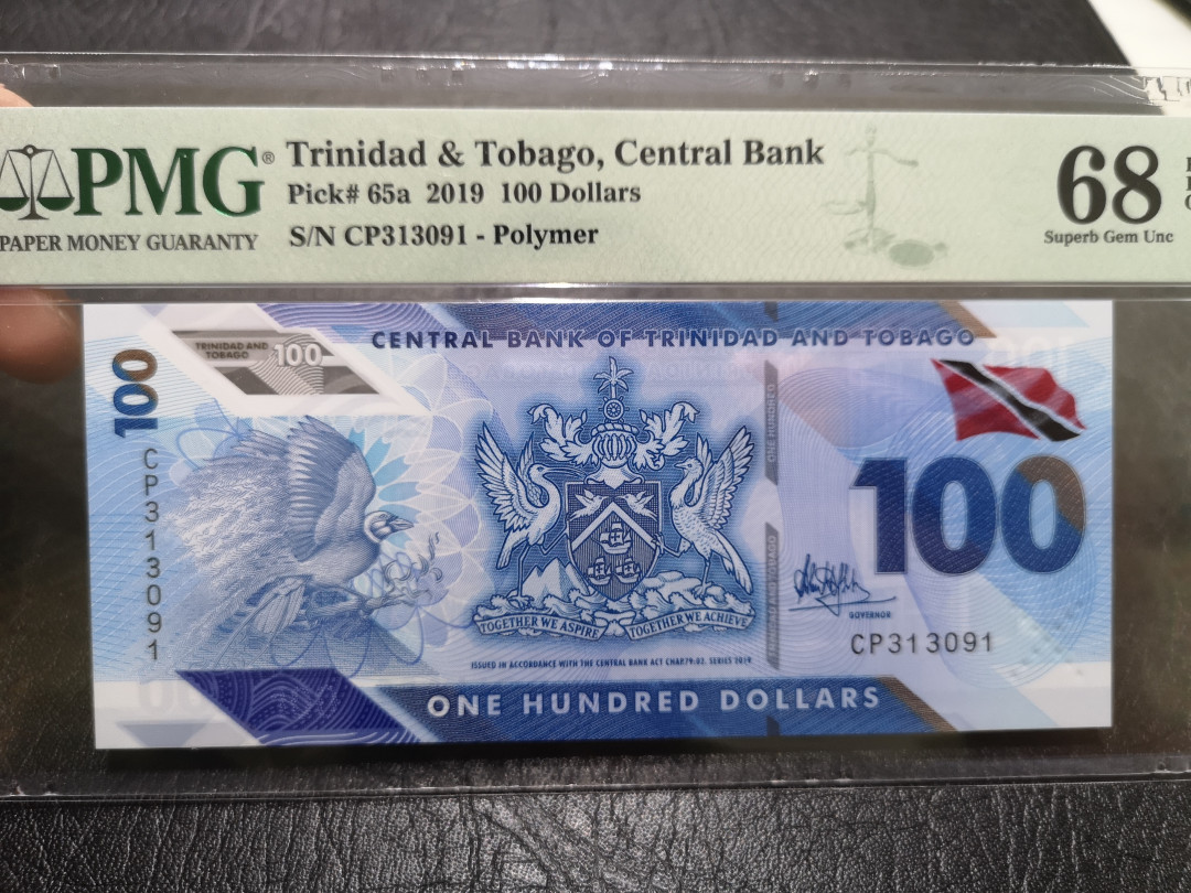 《外钞收藏家》第一百一十四期拍卖（共83拍） 2019年特尼达尼亚与多巴哥100大刀 PMG68