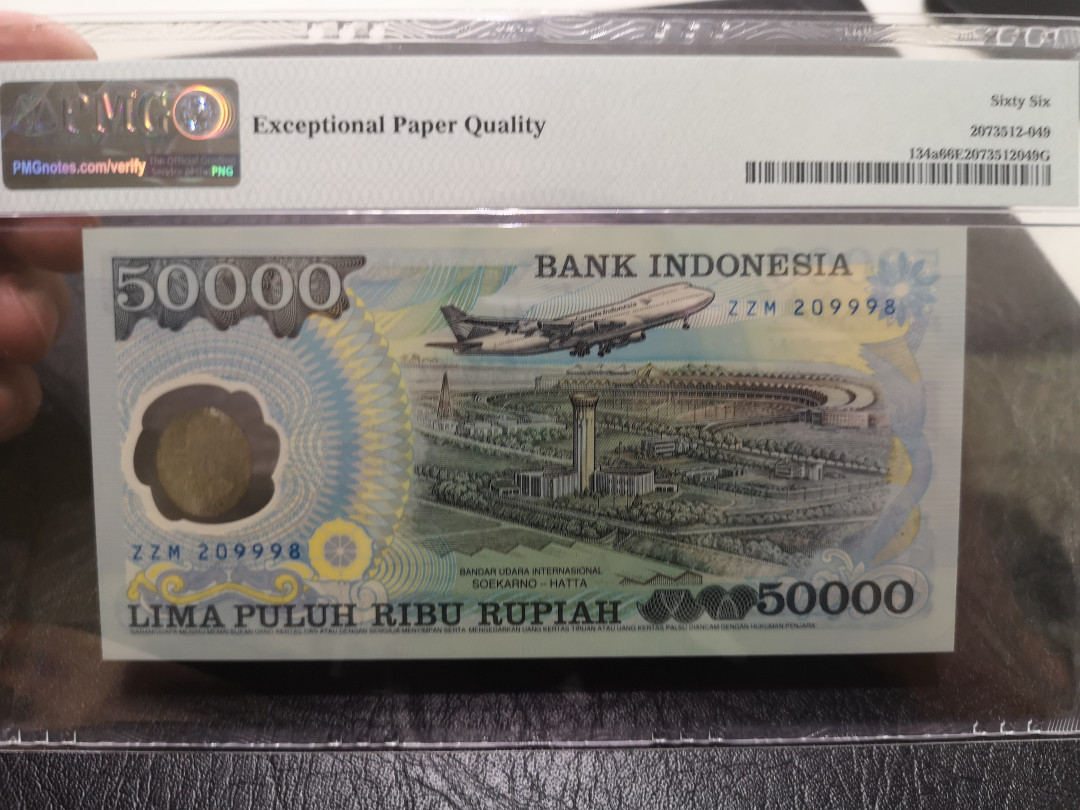 《外钞收藏家》第一百一十四期拍卖（共83拍） 1993年印度尼西亚5万纪念钞 PMG66 号码非常好