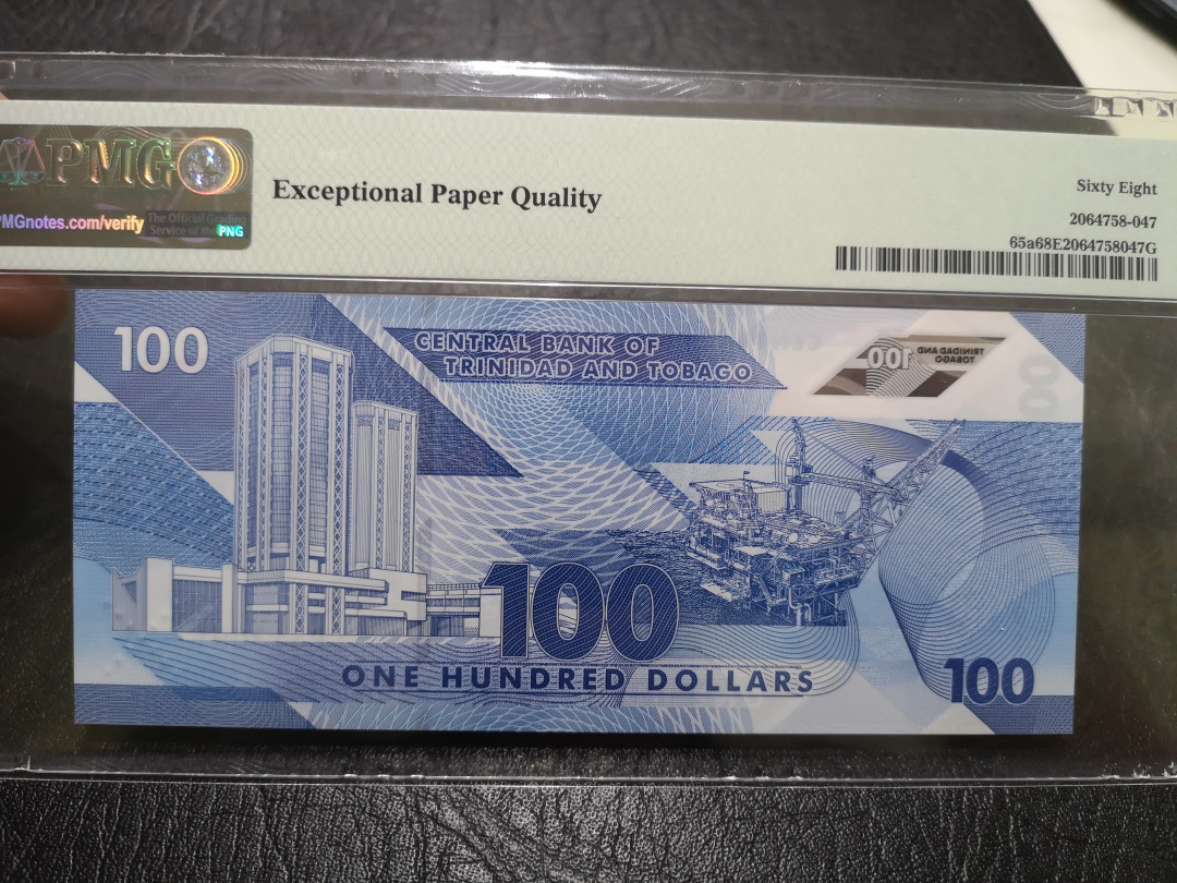 《外钞收藏家》第一百一十四期拍卖（共83拍） 2019年特尼达尼亚与多巴哥100大刀 PMG68