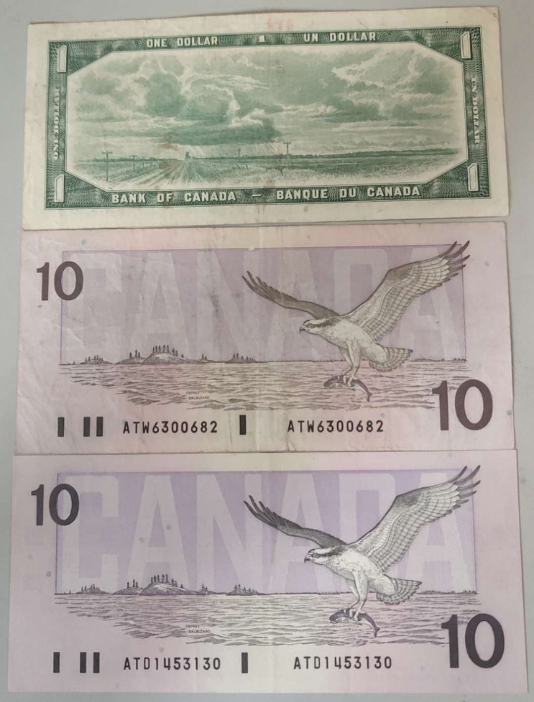 N&C第十一期: 欢乐捡漏场 加拿大三张 最下面的10元为全新（中软折)，上面两张流通品