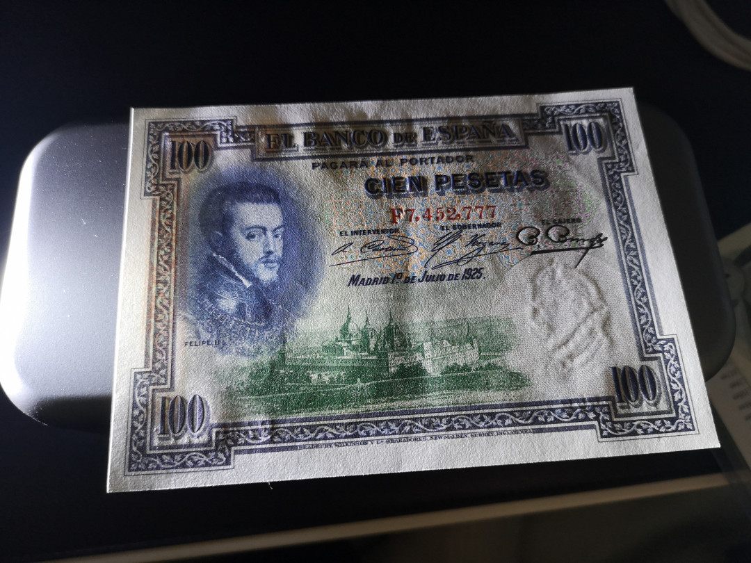 《外钞收藏家》第一百一十五期拍卖 1925年西班牙100比塞塔 全新 只有指甲印大小一个荧光反应