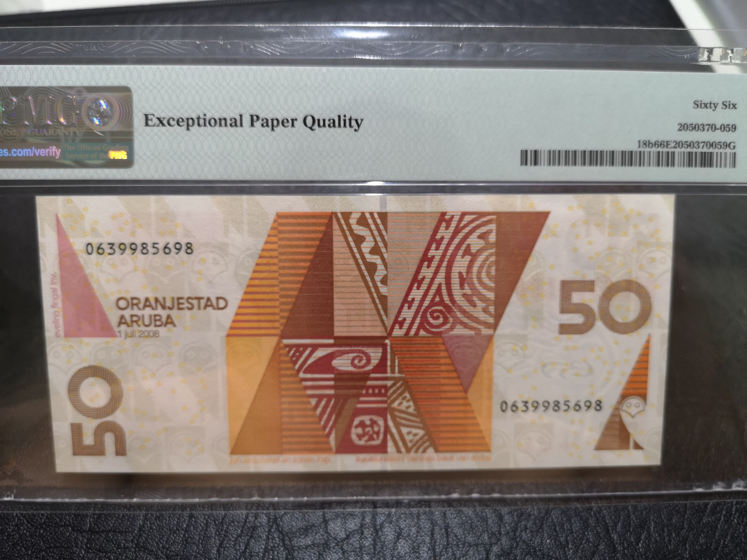 《外钞收藏家》第一百一十五期拍卖 2008年阿鲁巴50 JEZ作品 PMG66  无47尾8