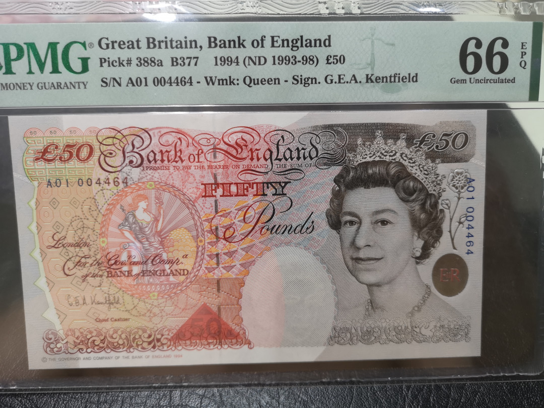 《外钞收藏家》第一百一十五期拍卖 1994年英国E序列20镑 PMG66 A01首发冠