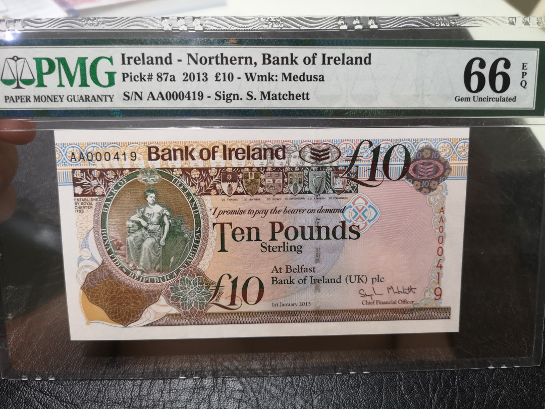 《外钞收藏家》第一百一十五期拍卖 2013年北爱尔兰50、20、10、5镑四张   A冠419同号钞 分数如图