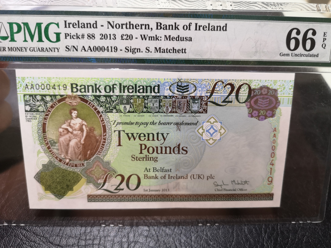 《外钞收藏家》第一百一十五期拍卖 2013年北爱尔兰50、20、10、5镑四张   A冠419同号钞 分数如图