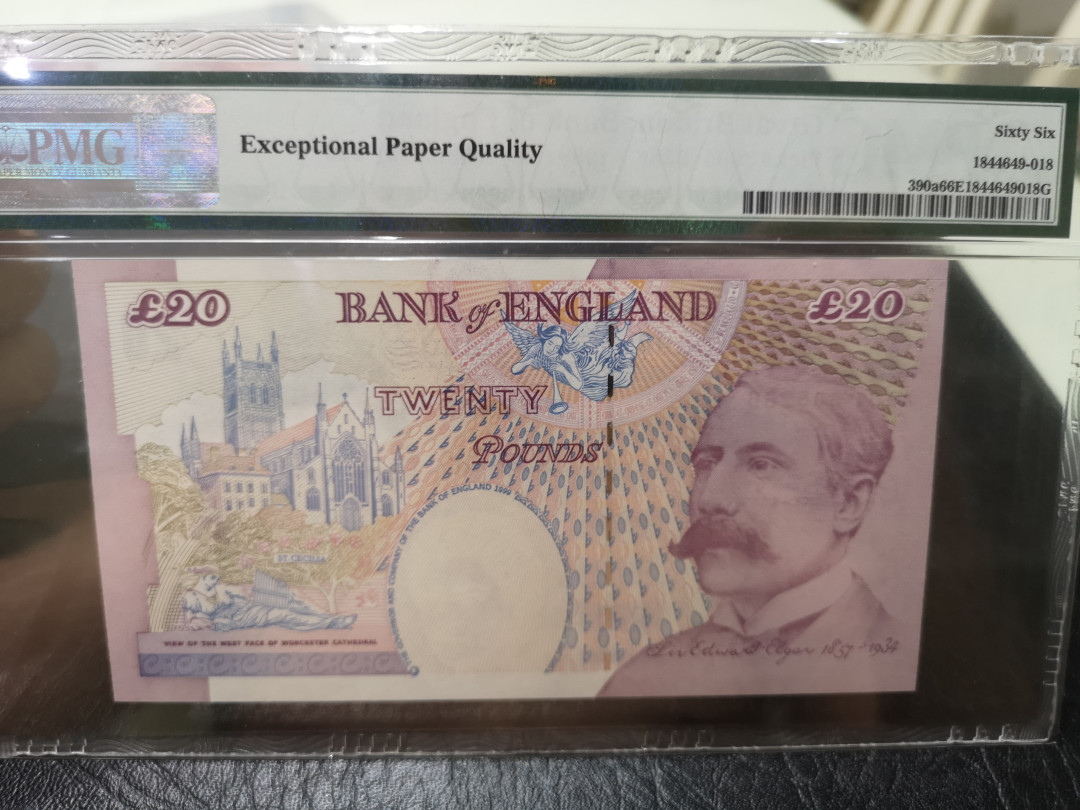 《外钞收藏家》第一百一十五期拍卖 1999年英国E序列20镑 PMG66 AA01首发冠 千位号