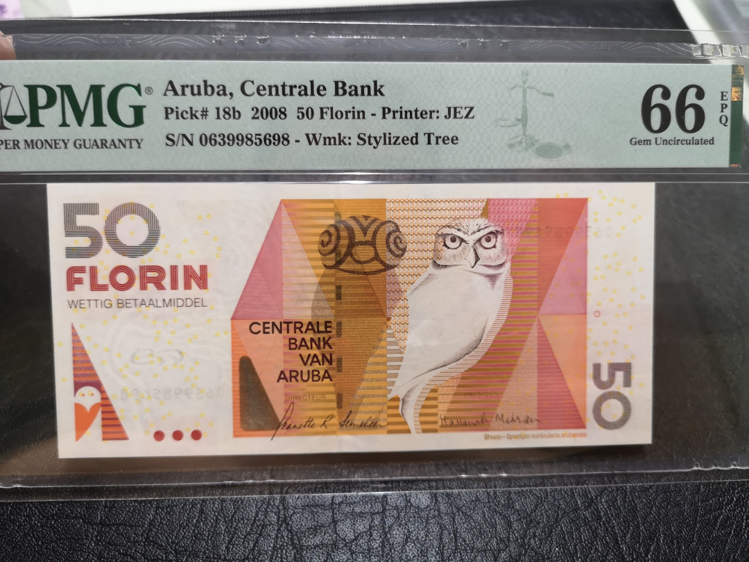 《外钞收藏家》第一百一十五期拍卖 2008年阿鲁巴50 JEZ作品 PMG66  无47尾8