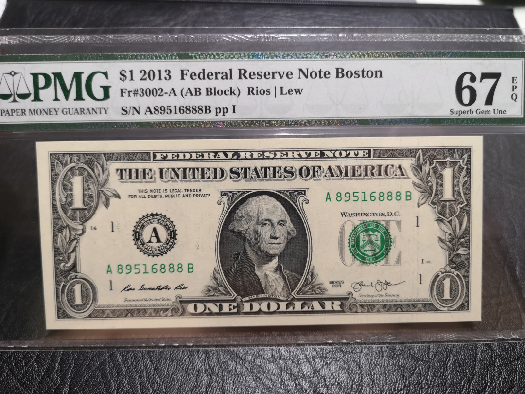 《外钞收藏家》第一百一十六期拍卖 2013年1美元 888豹子号 PMG67