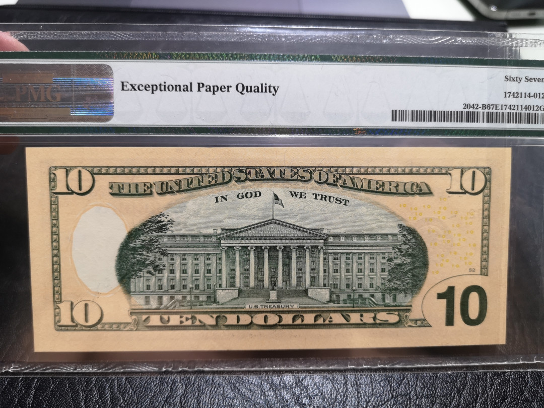 《外钞收藏家》第一百一十六期拍卖 2013年10美元 333豹子号  PMG67