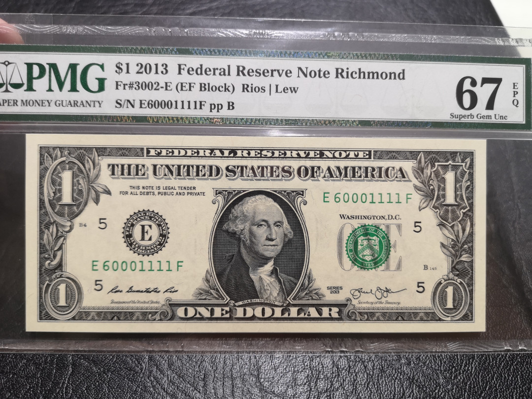 《外钞收藏家》第一百一十六期拍卖 2013年1美元 双豹子号狮子号 PMG67