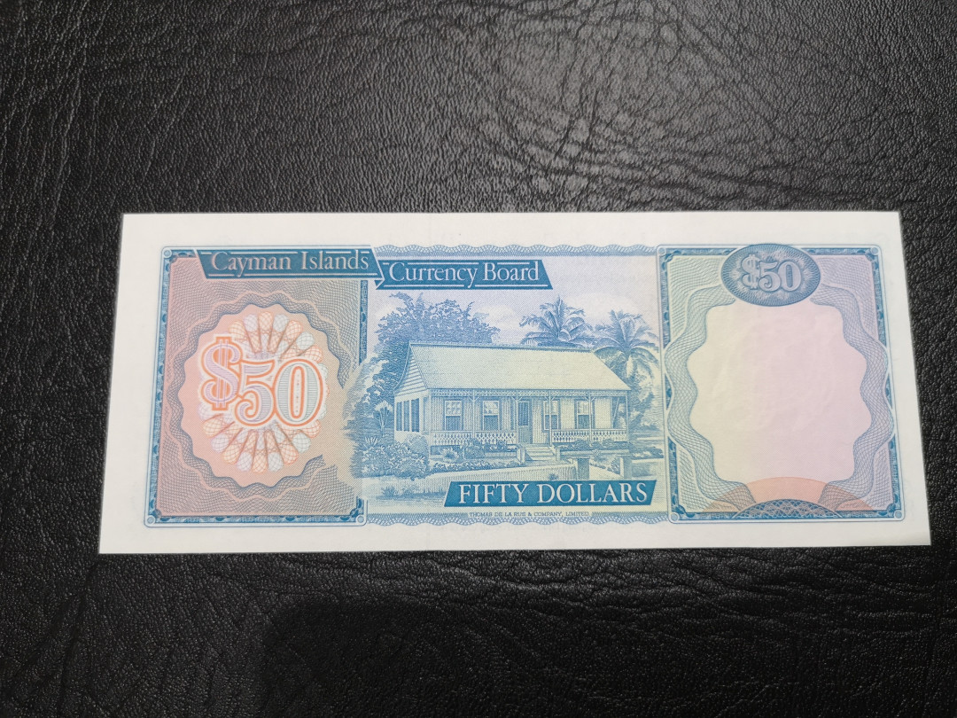 《外钞收藏家》第一百一十七期拍卖 开曼群岛1974年50刀 全新UNC 女王钞 A1冠