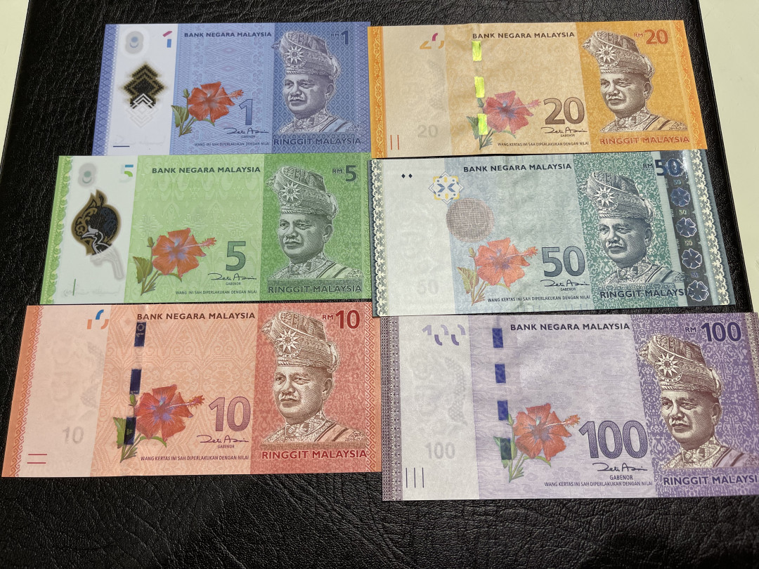 《外钞收藏家》第一百一十七期拍卖 马来西亚一套AA冠 全同号 千位号 全新UNC