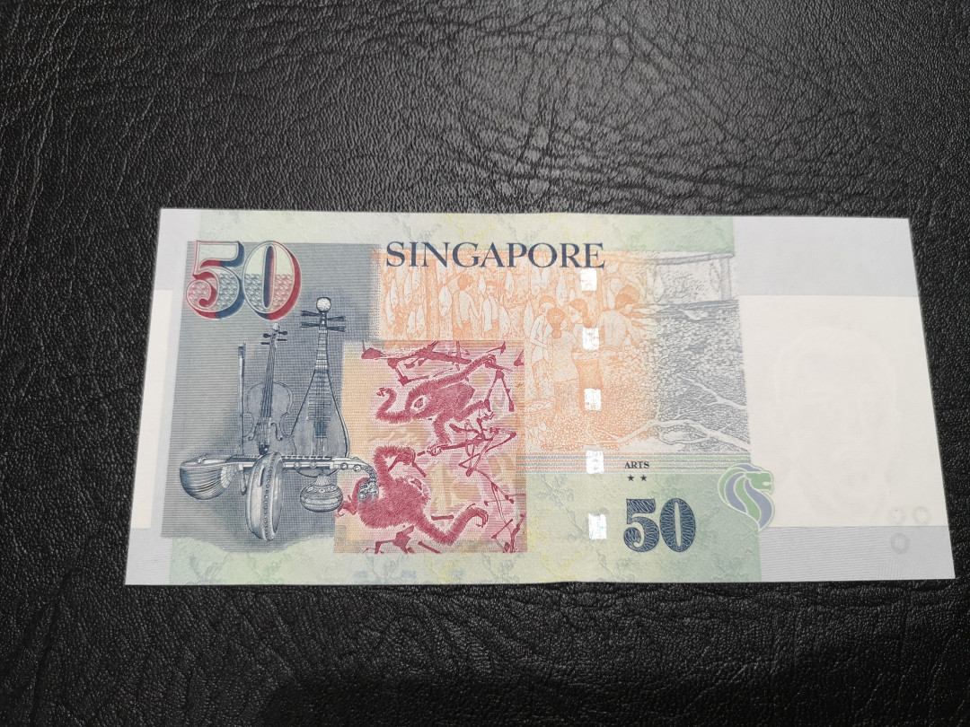 《外钞收藏家》第一百一十七期拍卖 新加坡人像版50  全新UNC 靓号