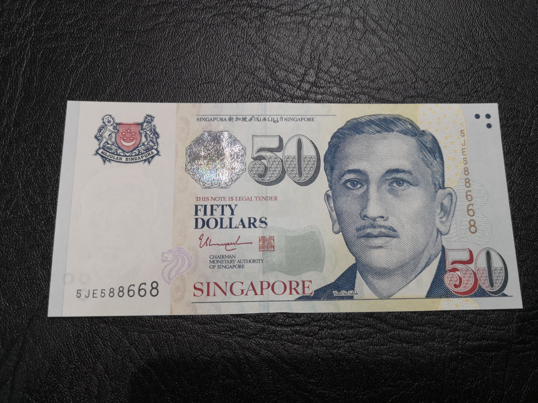《外钞收藏家》第一百一十七期拍卖 新加坡人像版50  全新UNC 靓号