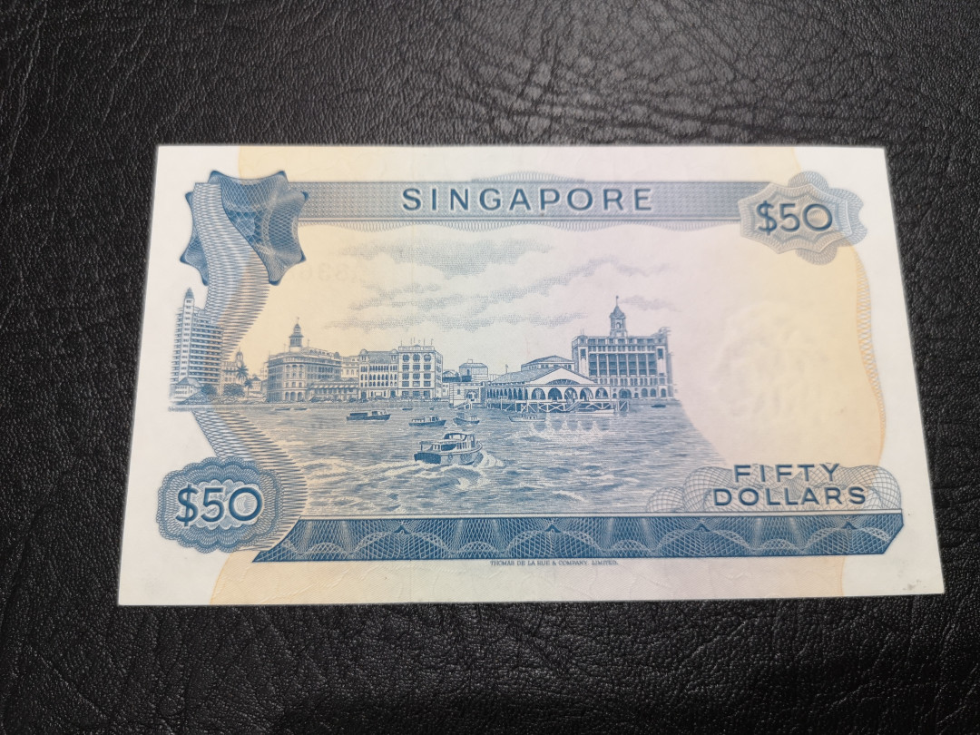 《外钞收藏家》第一百一十七期拍卖 新加坡花版50  近全新 无折 荧光有部分潮