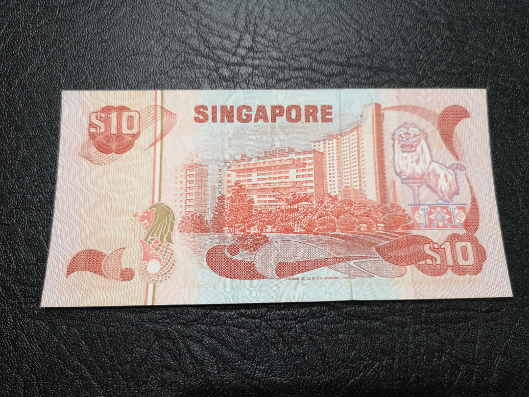 《外钞收藏家》第一百一十八期拍卖 新加坡鸟版10 全新UNC