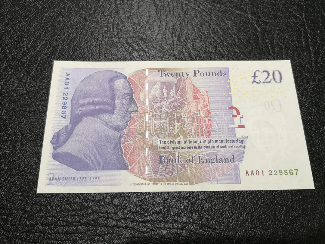 《外钞收藏家》第一百一十八期拍卖 英国E序列20镑 AA01 首发冠 全新UNC