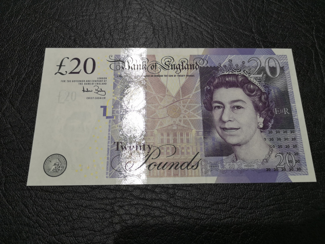 《外钞收藏家》第一百一十八期拍卖 英国E序列20镑 AA01 首发冠 全新UNC