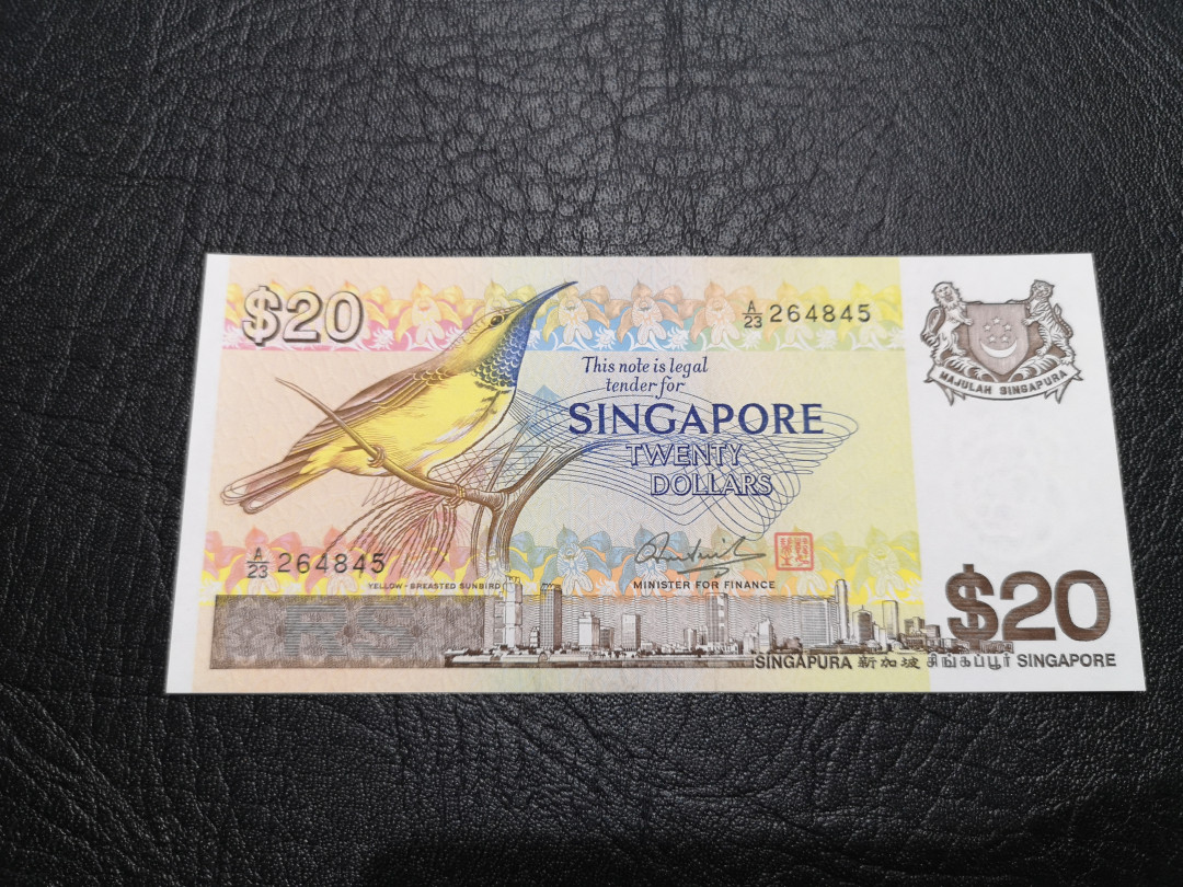 《外钞收藏家》第一百一十九期拍卖（本期106件拍品） 新加坡鸟版10元 近全新 有潮癍