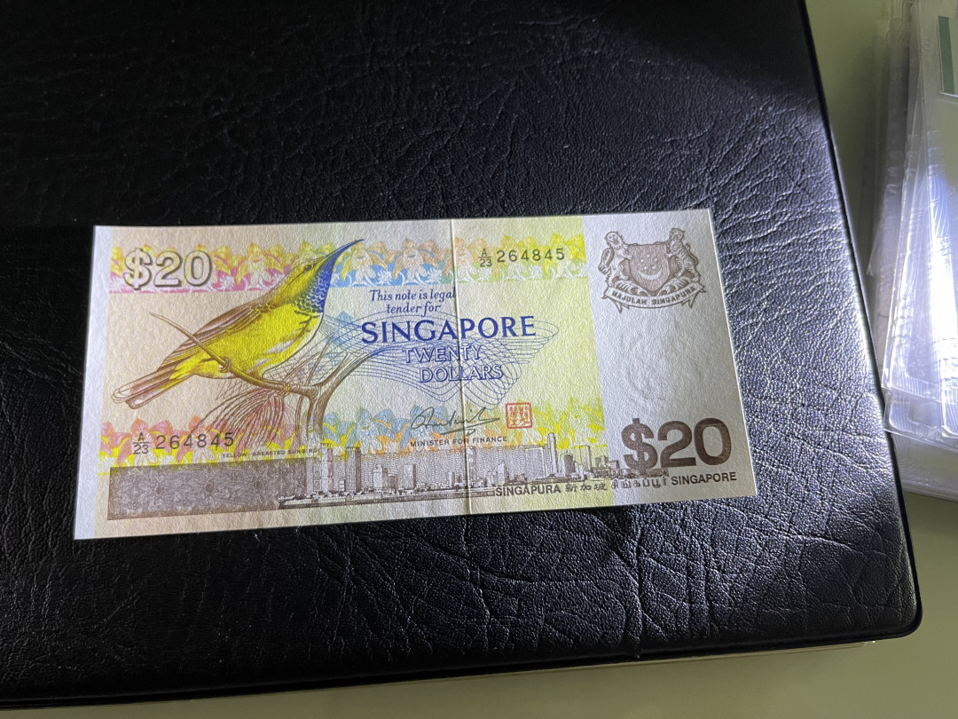 《外钞收藏家》第一百一十九期拍卖（本期106件拍品） 新加坡鸟版10元 近全新 有潮癍