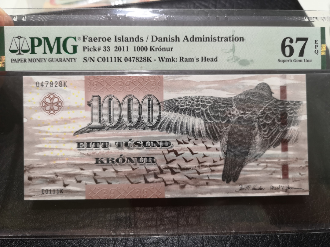 《外钞收藏家》第一百一十九期拍卖（本期106件拍品） 2011年法罗群岛1000克朗 PMG67