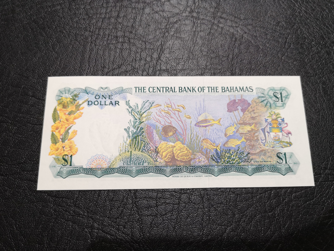 《外钞收藏家》第一百一十九期拍卖（本期106件拍品） 1974年巴哈马1 彩背 全新UNC