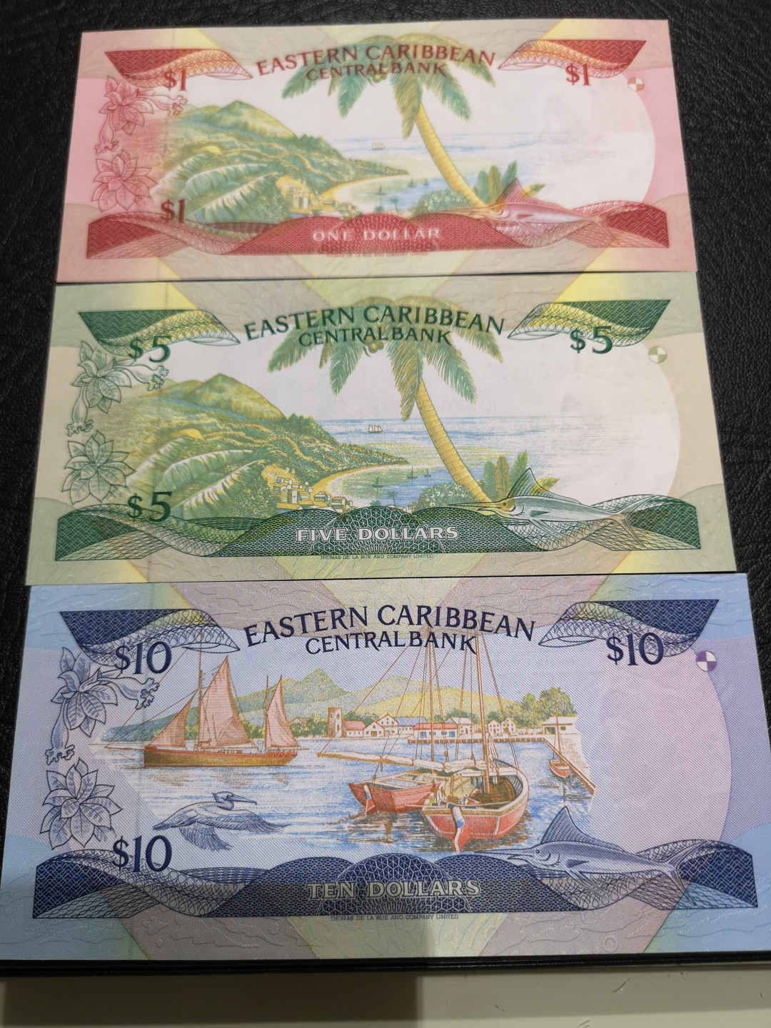 《外钞收藏家》第一百一十九期拍卖（本期106件拍品） 东加勒比1、5、10三张小套 全新UNC