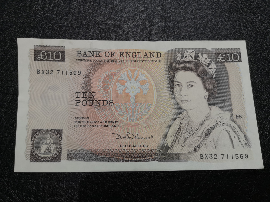 《外钞收藏家》第一百一十九期拍卖（本期106件拍品） 英国D序列10镑 AU 有大面积癍