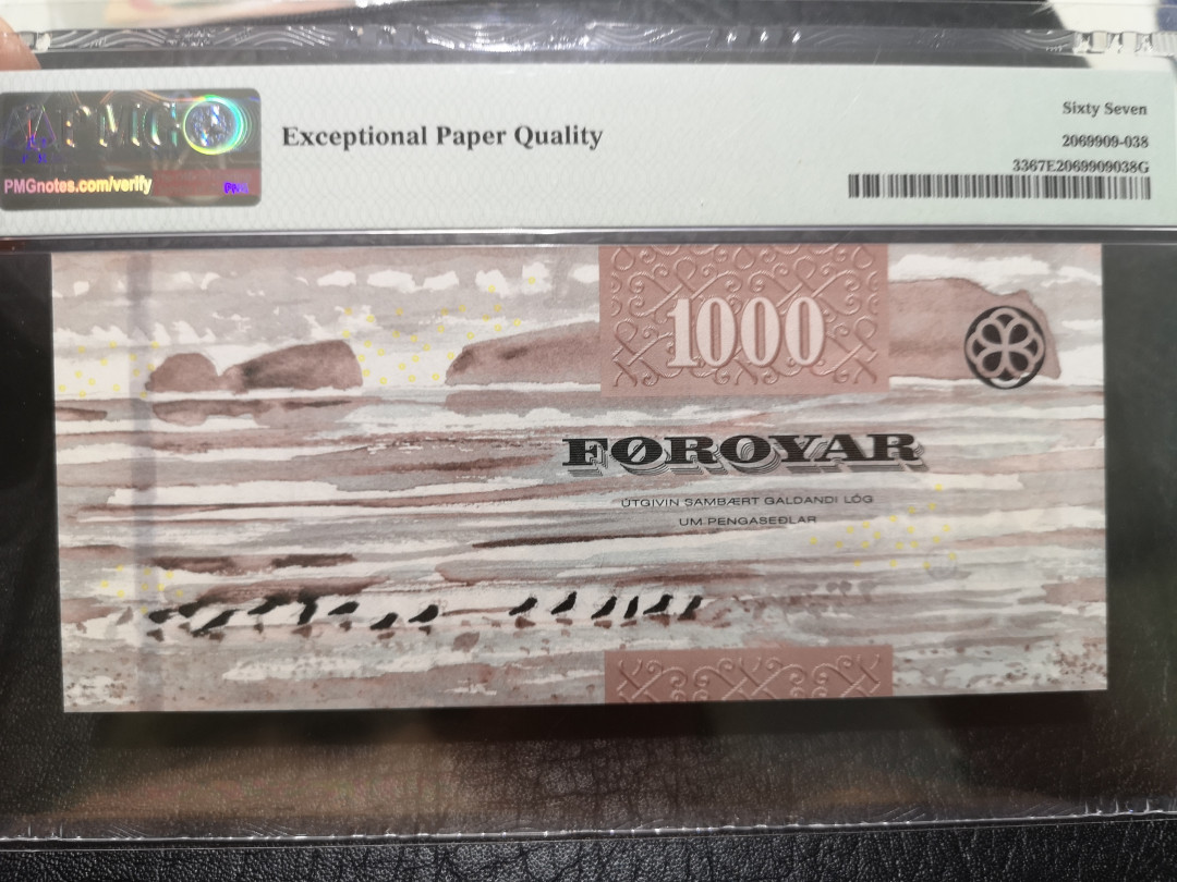 《外钞收藏家》第一百一十九期拍卖（本期106件拍品） 2011年法罗群岛1000克朗 PMG67