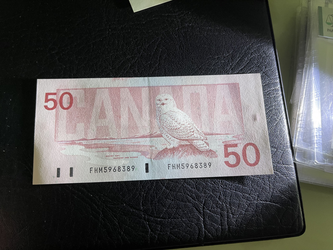 《外钞收藏家》第一百一十九期拍卖（本期106件拍品） 加拿大鸟版50加元 有疑似软折 鉴定AU