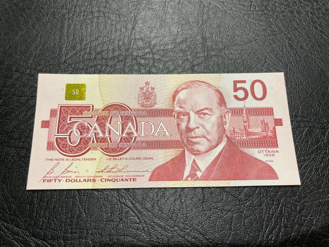 《外钞收藏家》第一百一十九期拍卖（本期106件拍品） 加拿大鸟版50加元 有疑似软折 鉴定AU