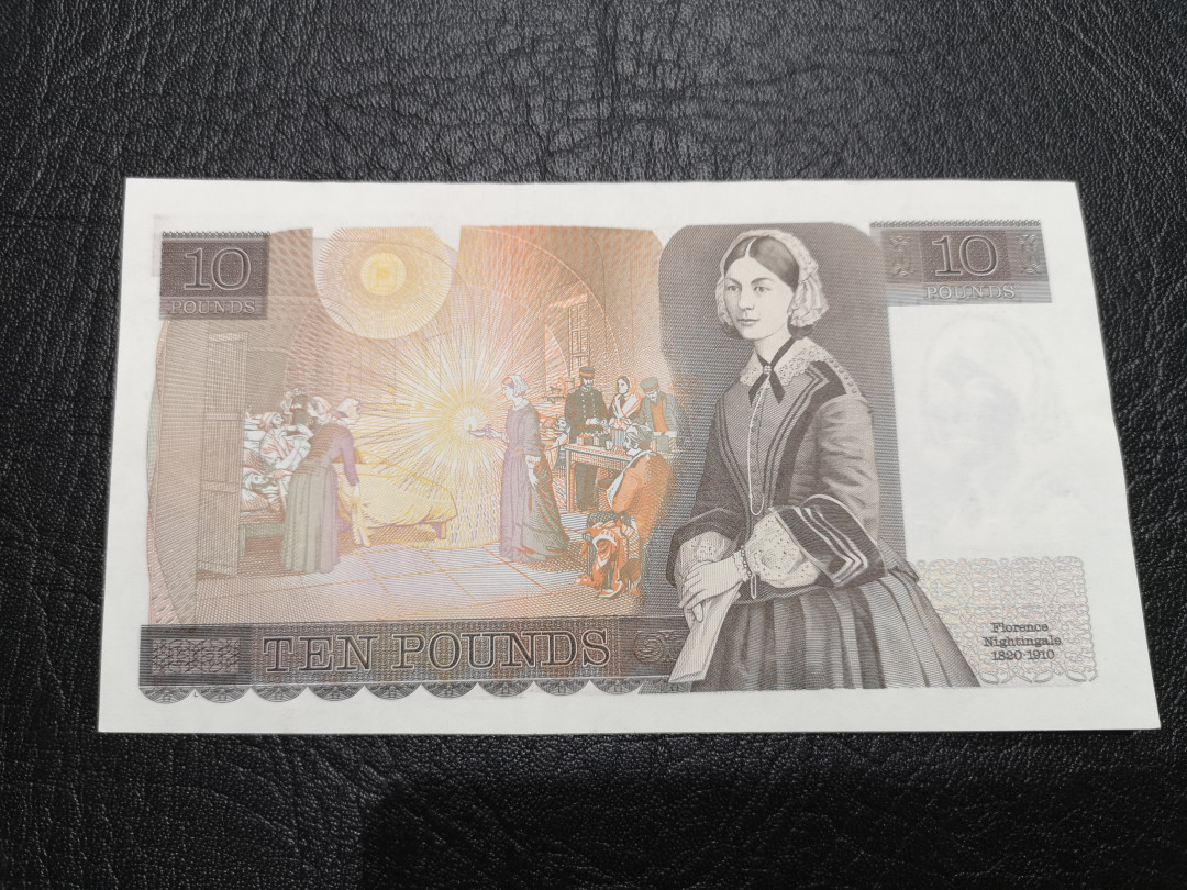 《外钞收藏家》第一百一十九期拍卖（本期106件拍品） 英国D序列10镑 AU 有大面积癍