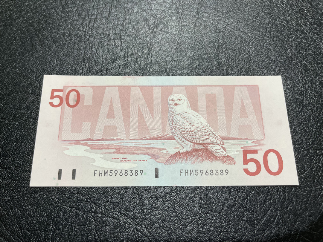 《外钞收藏家》第一百一十九期拍卖（本期106件拍品） 加拿大鸟版50加元 有疑似软折 鉴定AU