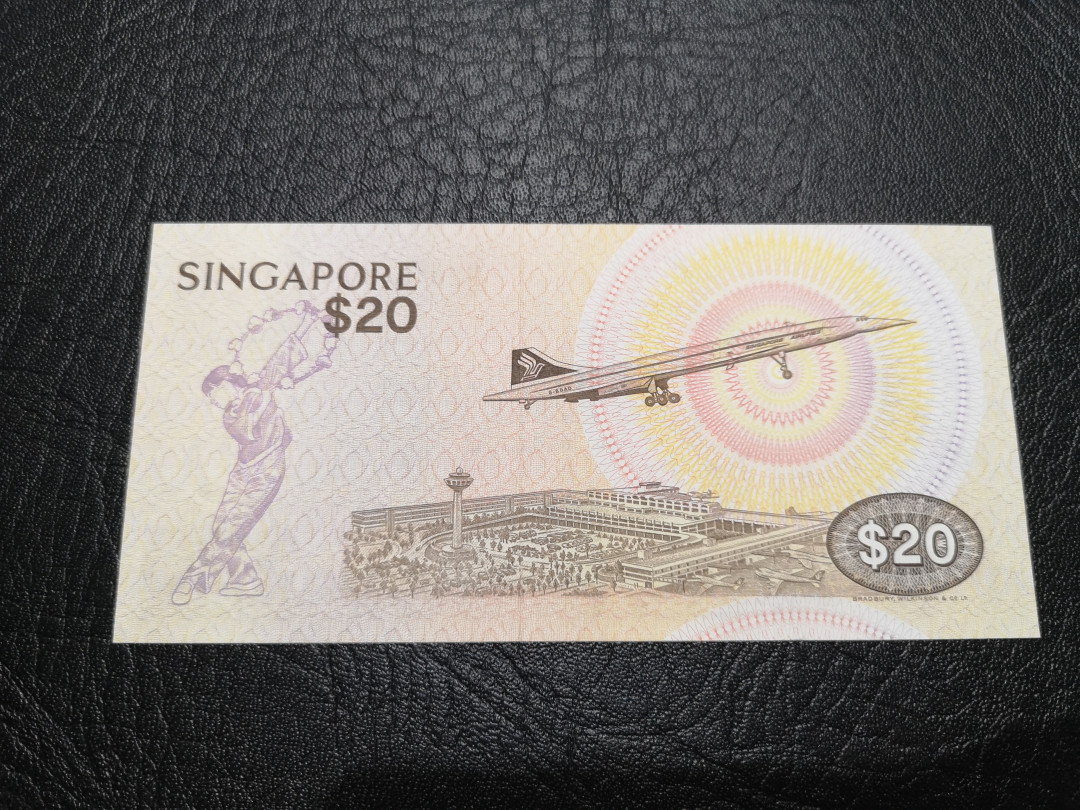 《外钞收藏家》第一百一十九期拍卖（本期106件拍品） 新加坡鸟版10元 近全新 有潮癍