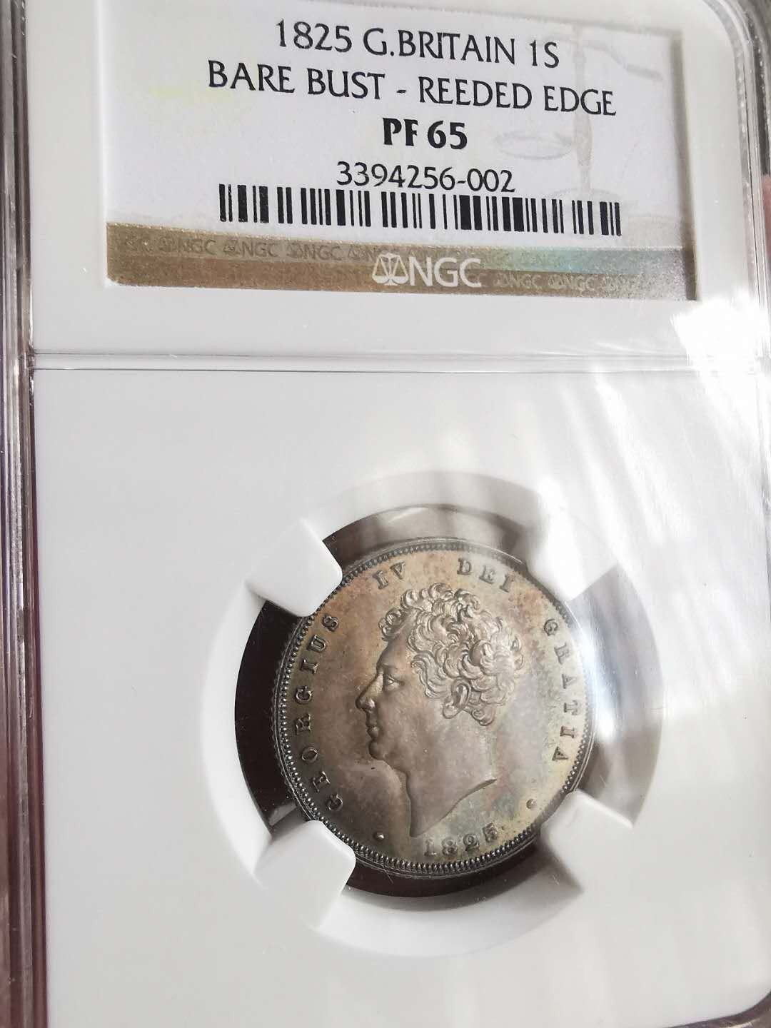 凡希社世界钱币微拍第一百六十五期 罕！1825英国乔四精铸先令NGC-PF65油画五彩顶级品！