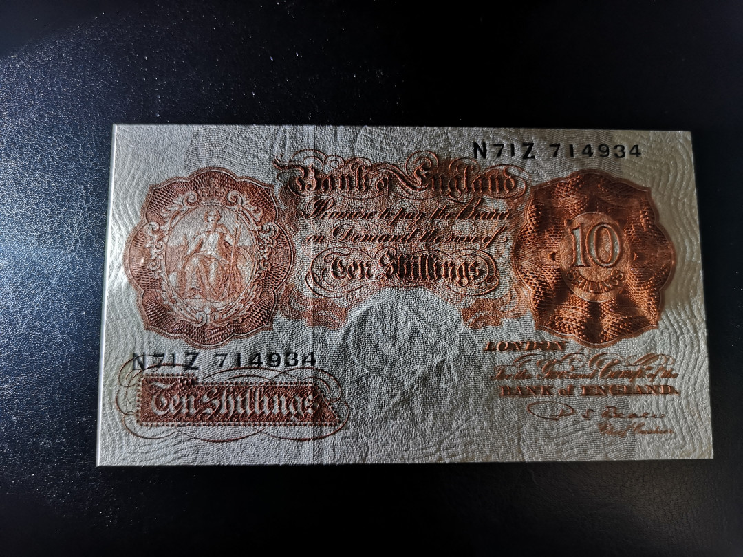 《外钞收藏家》第一百二十一期拍卖 英国A序列10先令 全新UNC
