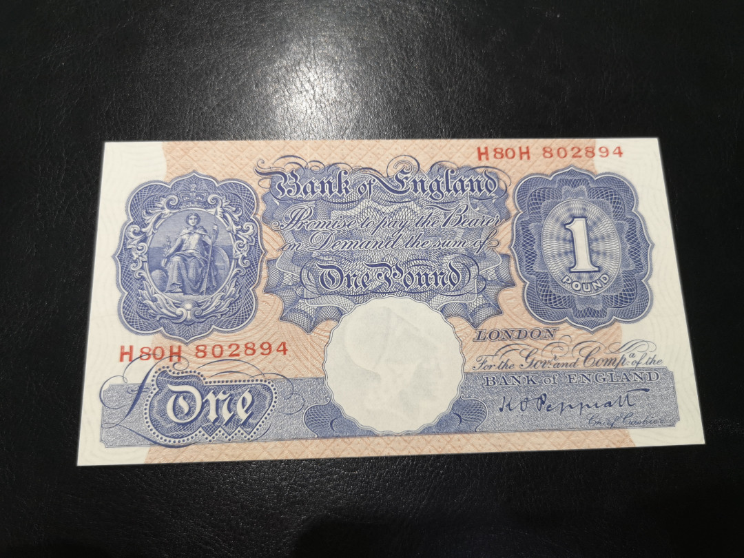 《外钞收藏家》第一百二十一期拍卖 英国A序列1镑 近全新 角不太好 不绝 参考照片