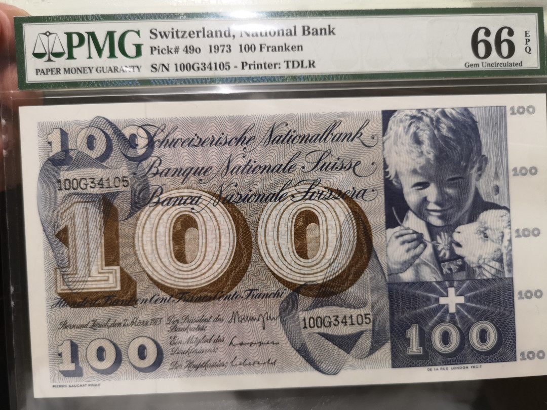 《外钞收藏家》第一百二十二期拍卖（共76件） 1973年瑞士100法郎  PMG66 割袍 大票幅