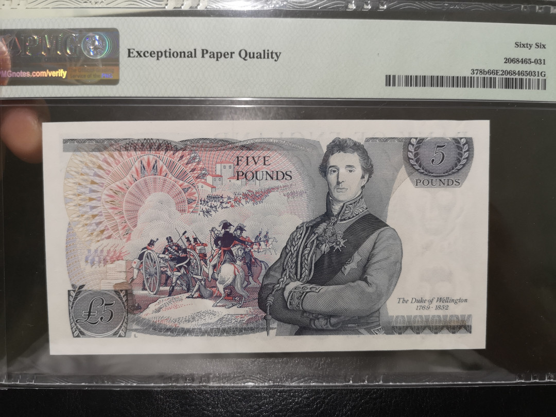 《外钞收藏家》第一百二十二期拍卖（共76件） 英国D序列5镑 PMG66