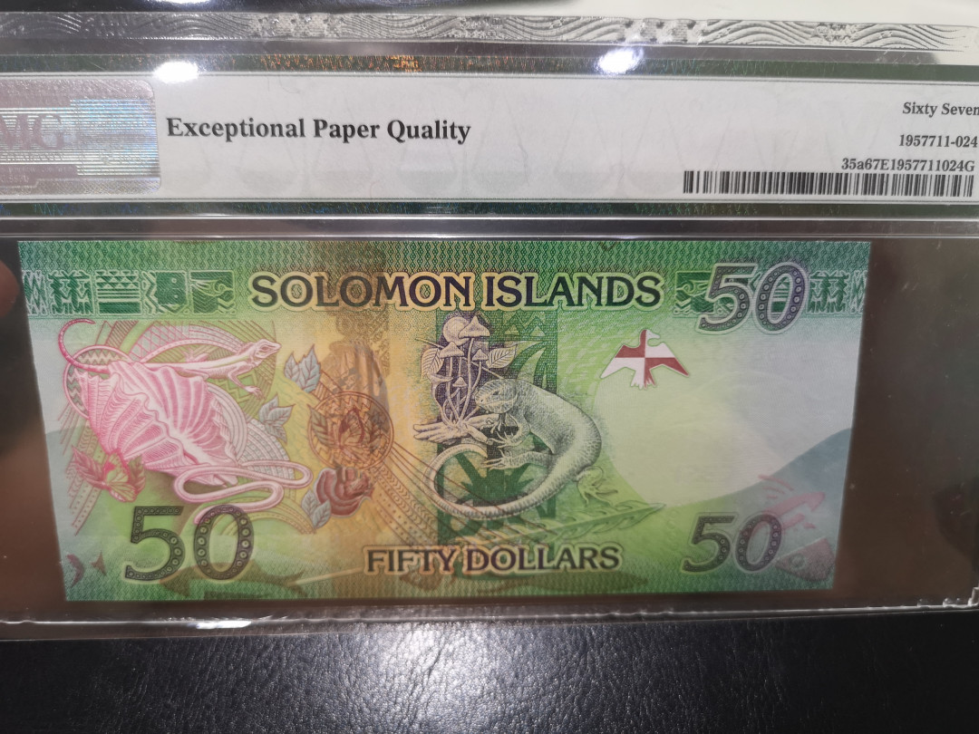 《外钞收藏家》第一百二十四期拍卖 2013年所罗门群岛50 pmg67