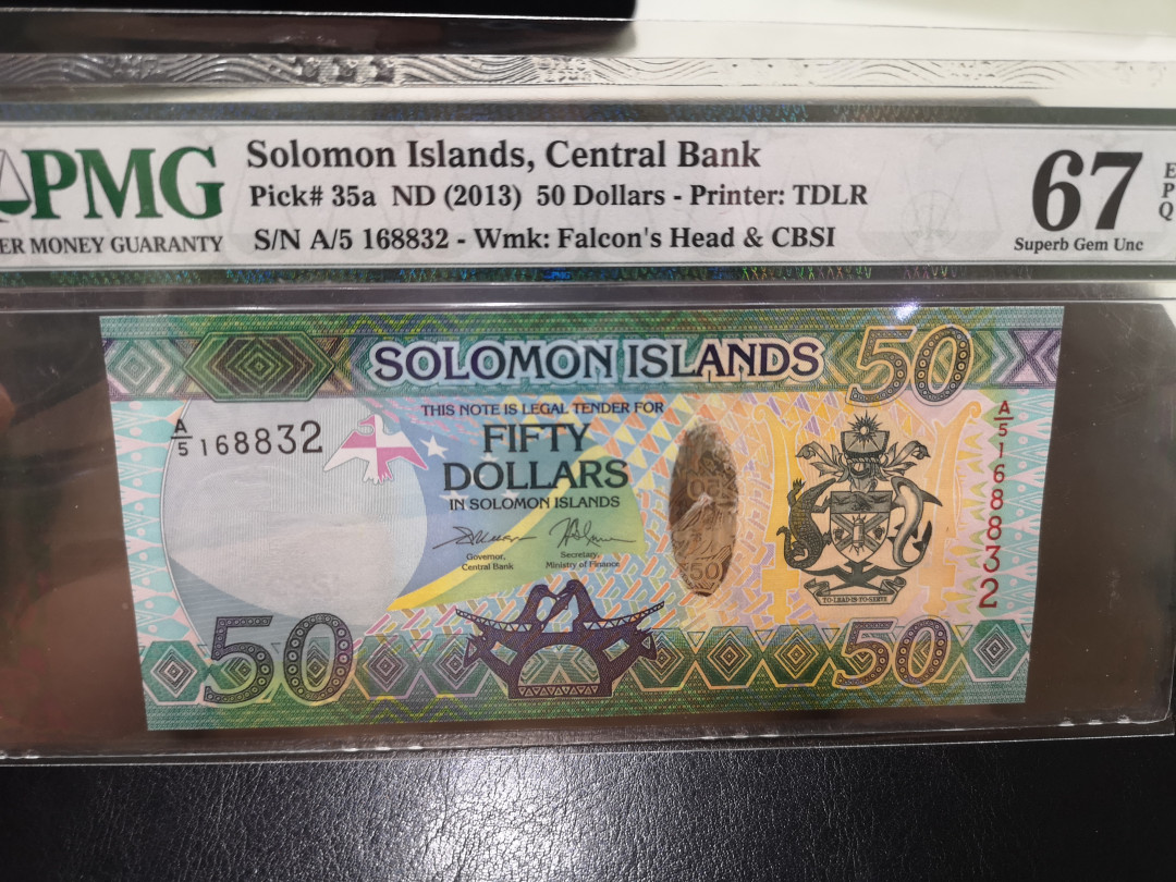 《外钞收藏家》第一百二十四期拍卖 2013年所罗门群岛50 pmg67