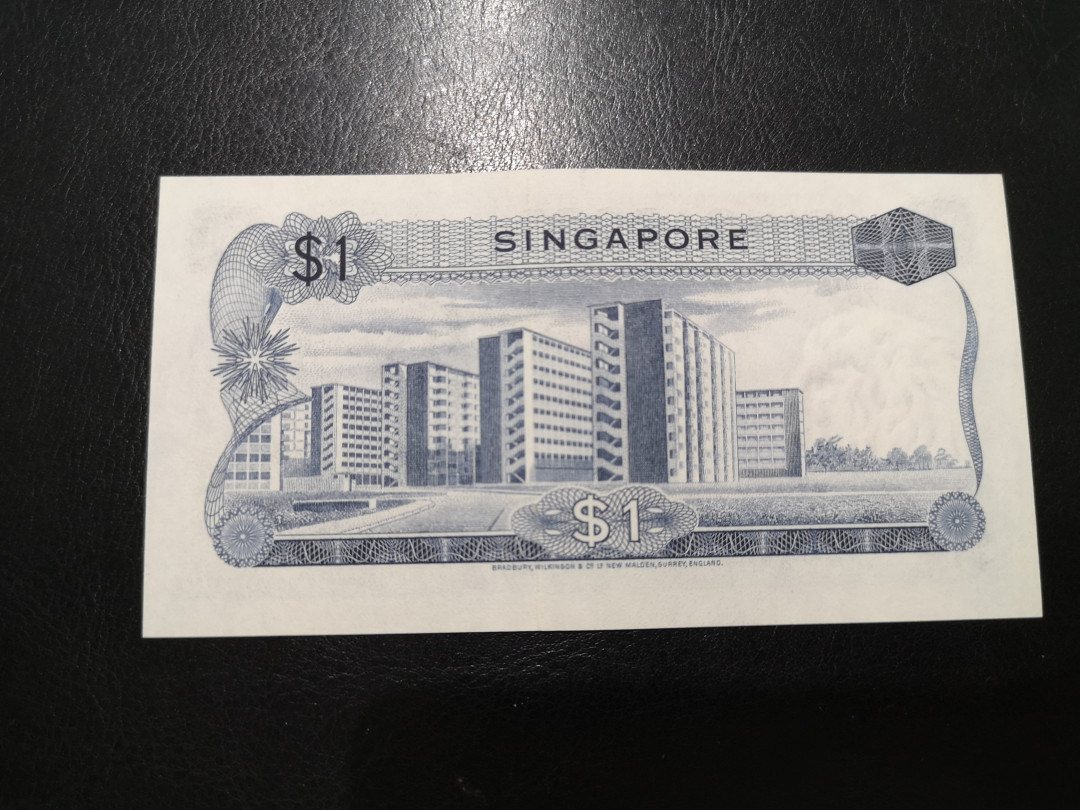 《外钞收藏家》第一百二十四期拍卖 新加坡花版1元 全新