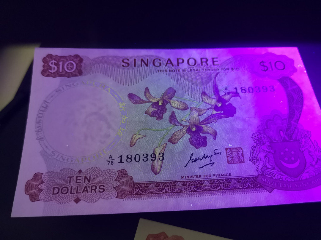 《外钞收藏家》第一百二十四期拍卖 新加坡花版10元 近全新 轻微受潮