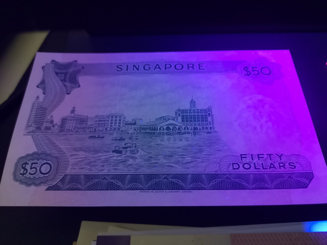 《外钞收藏家》第一百二十四期拍卖 新加坡花版50元 AU有中折