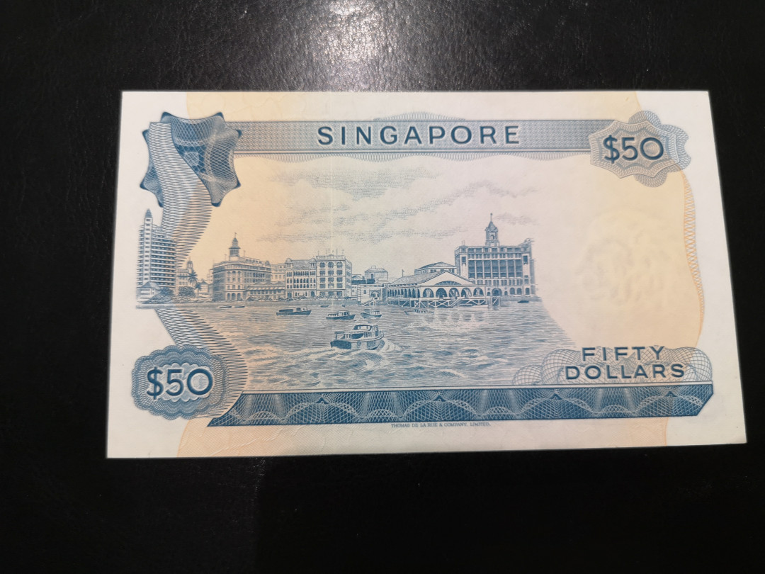 《外钞收藏家》第一百二十四期拍卖 新加坡花版50元 AU有中折