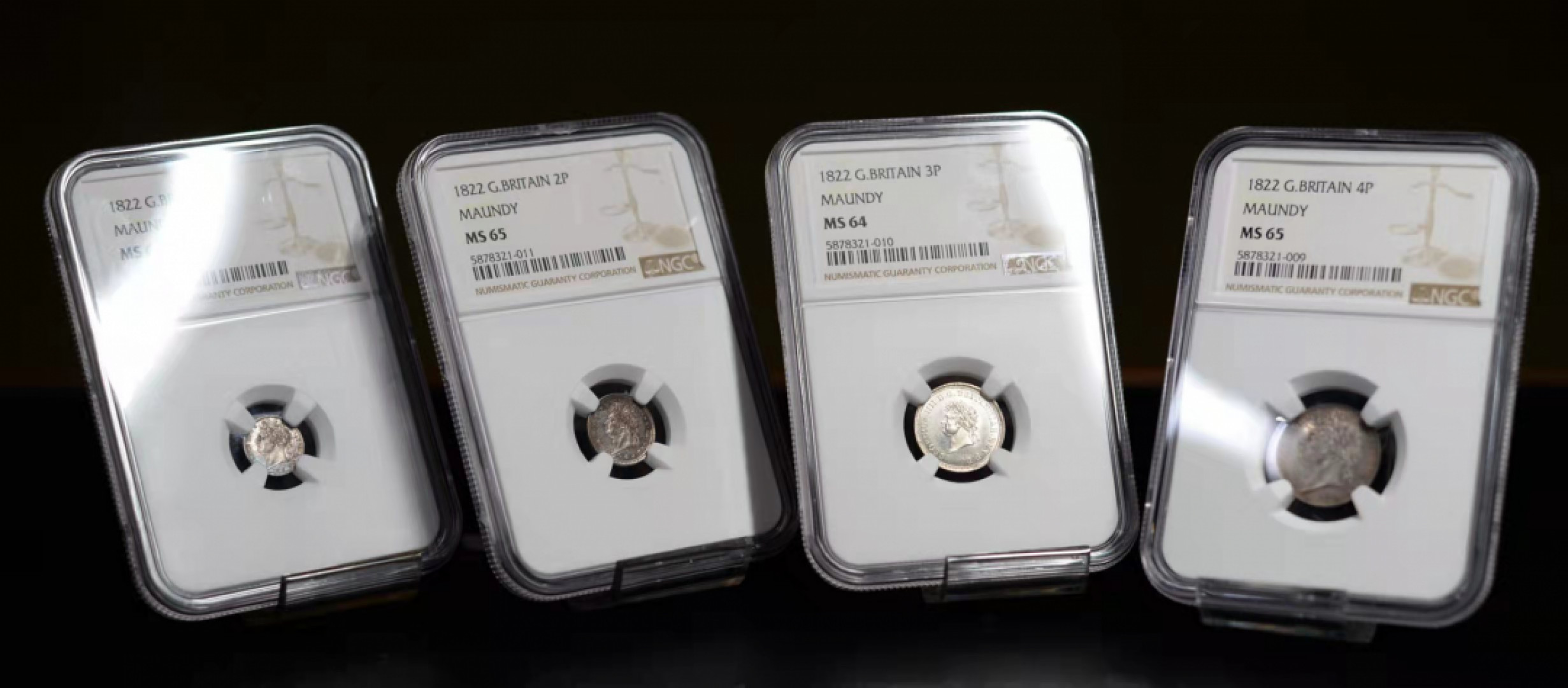 凡希社世界钱币微拍第一百六十九期 稀！1822乔四濯足币四枚NGC-MS64/65/65/66高分盒子连号！