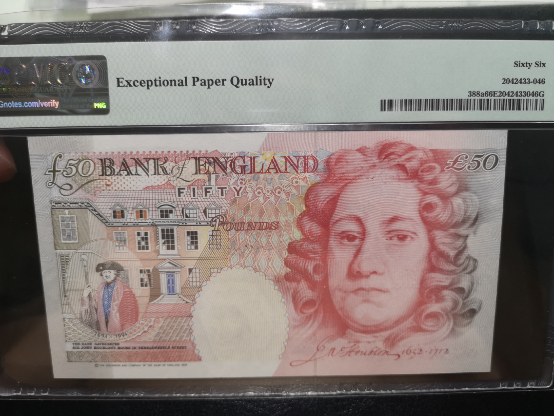 《外钞收藏家》第一百二十五期拍卖 英国E序列50镑 PMG66 A01首发冠
