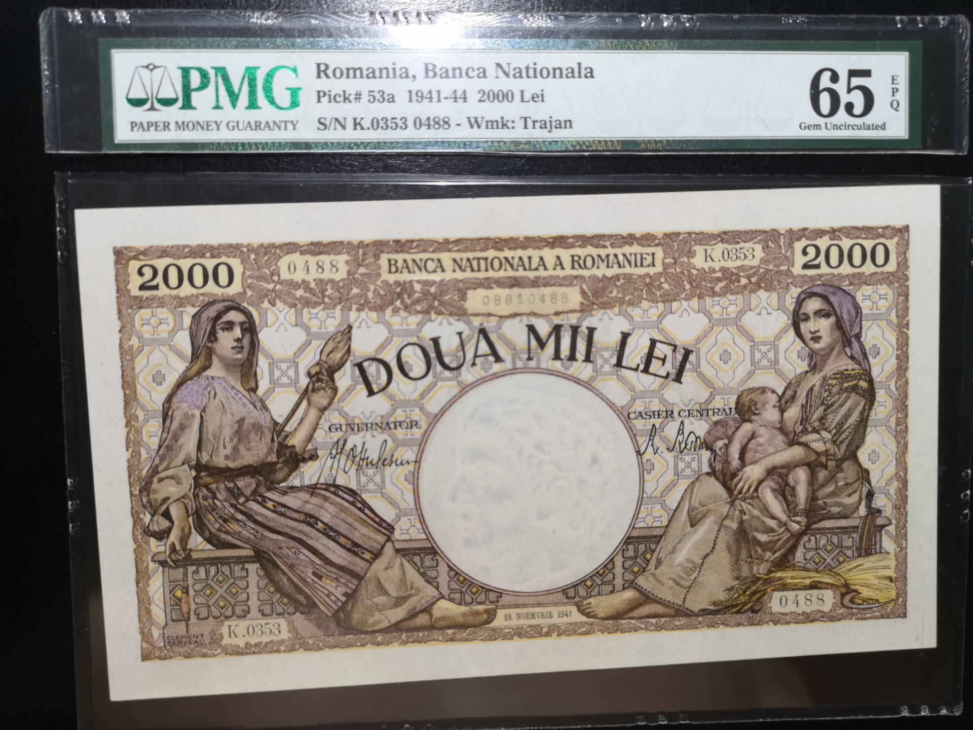 《外钞收藏家》第一百二十五期拍卖 1941年罗马尼亚2000 PMG65 但是但是但是......分数部分壳子被剪了 纸币部分封装完好