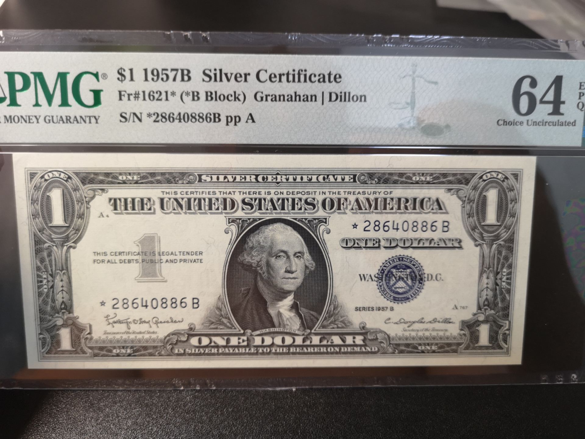 《外钞收藏家》第一百二十六期拍卖 1957年1美元 蓝库印 PMG64 补号