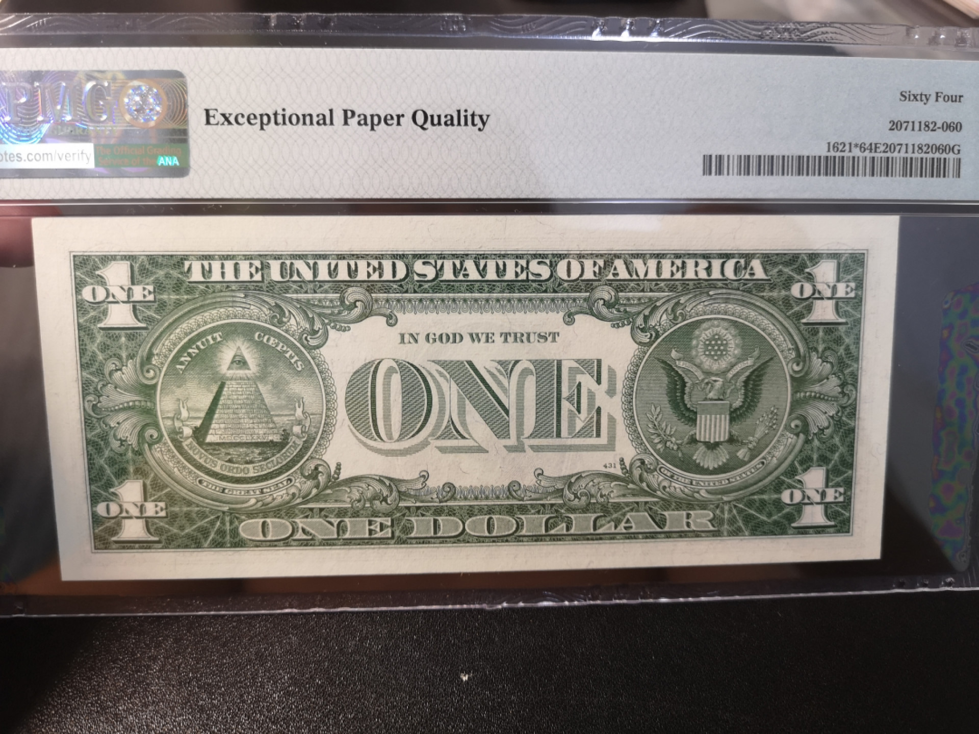 《外钞收藏家》第一百二十六期拍卖 1957年1美元 蓝库印 PMG64 补号